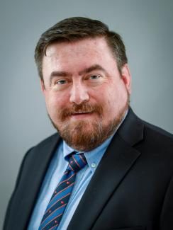 Chris Larmour's headshot